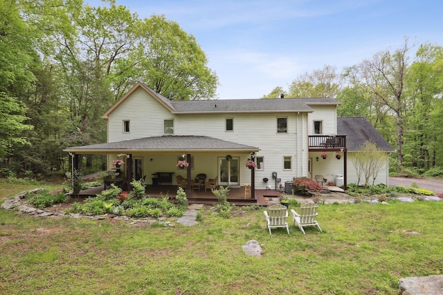 8 Grants Ln, New Milford, CT 06776 - back of property featuring a lawn, a deck, and a shingled roof