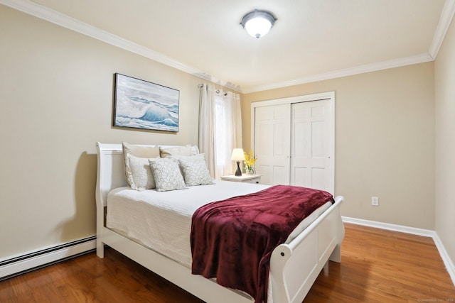8 Grants Ln, New Milford, CT 06776 - bedroom with a baseboard heating unit, ornamental molding, dark wood finished floors, a closet, and baseboards