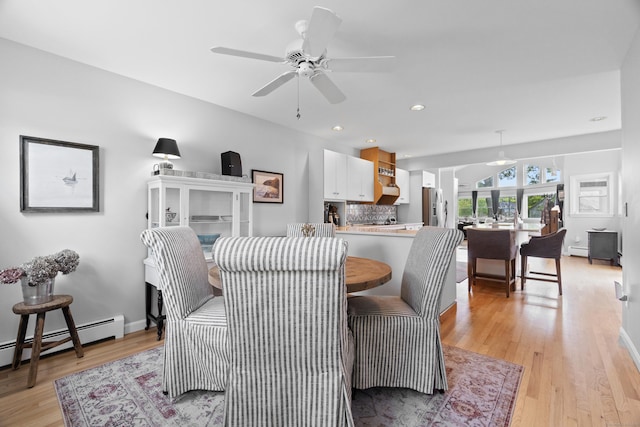 410 Noank Rd, Groton, CT 06355 - dining room with a baseboard radiator, light wood finished floors, ceiling fan, recessed lighting, and baseboards