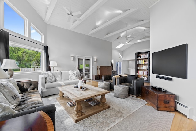 410 Noank Rd, Groton, CT 06355 - living area featuring ceiling fan, a baseboard heating unit, high vaulted ceiling, wood finished floors, and beamed ceiling