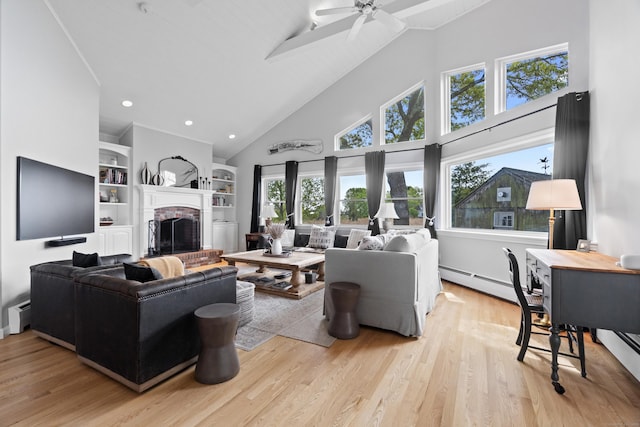 410 Noank Rd, Groton, CT 06355 - living area with high vaulted ceiling, a baseboard radiator, a baseboard heating unit, light wood-style flooring, and ceiling fan