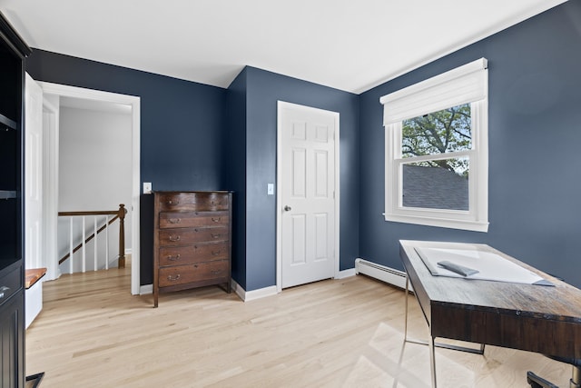 410 Noank Rd, Groton, CT 06355 - home office with baseboard heating, light wood finished floors, and baseboards