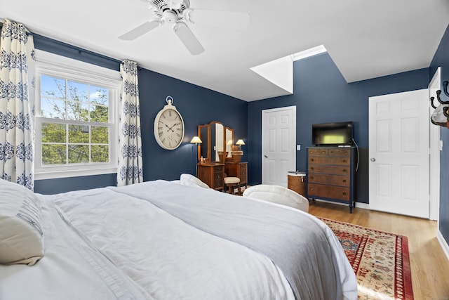 410 Noank Rd, Groton, CT 06355 - bedroom with wood finished floors and a ceiling fan