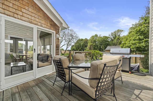 410 Noank Rd, Groton, CT 06355 - wooden deck with outdoor dining space and area for grilling