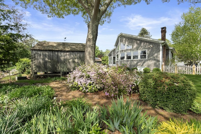 410 Noank Rd, Groton, CT 06355 - back of house with fence and a chimney