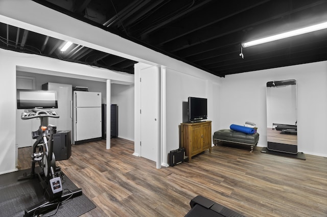 410 Noank Rd, Groton, CT 06355 - exercise room with wood finished floors and baseboards