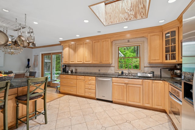 14 Button Rd, Shelton, CT 06484 - kitchen featuring stainless steel appliances, a sink, crown molding, recessed lighting, and glass insert cabinets