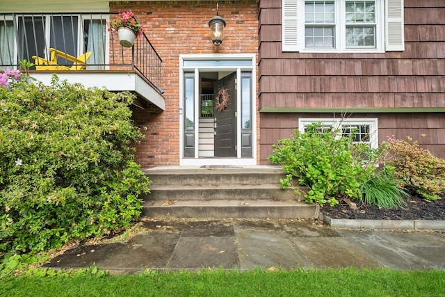 14 Button Rd, Shelton, CT 06484 - view of exterior entry featuring brick siding