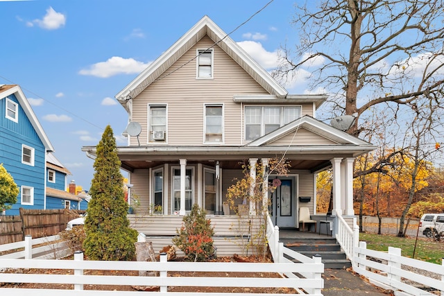 56 Gem Ave, Bridgeport, CT 06606 - view of front of home featuring a porch and a fenced front yard