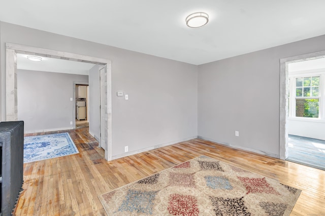 56 Gem Ave, Bridgeport, CT 06606 - empty room with wood finished floors and baseboards