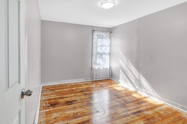 56 Gem Ave, Bridgeport, CT 06606 - unfurnished room with hardwood / wood-style flooring and baseboards