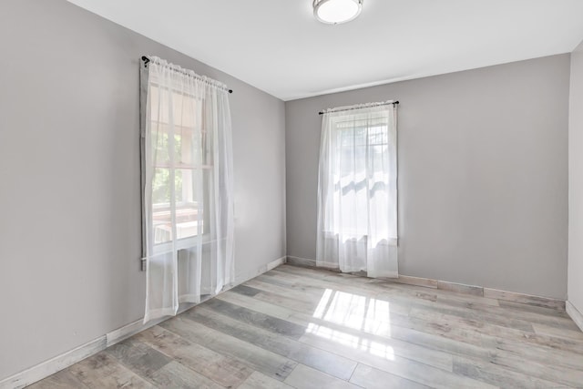 56 Gem Ave, Bridgeport, CT 06606 - unfurnished room featuring baseboards and wood finished floors