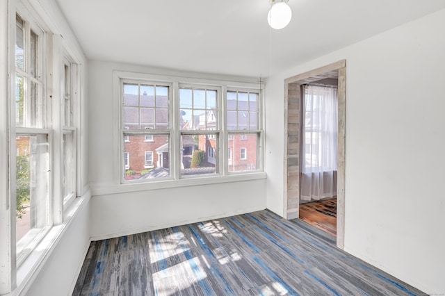 56 Gem Ave, Bridgeport, CT 06606 - unfurnished room featuring healthy amount of natural light and wood finished floors