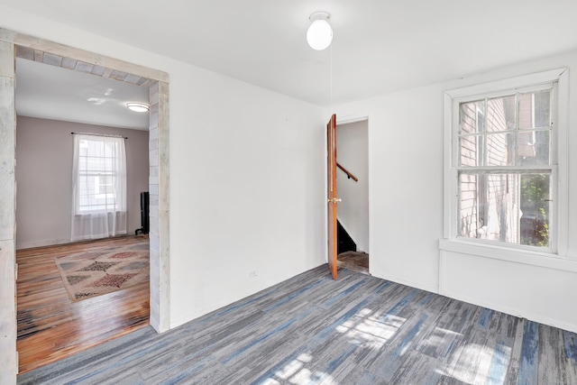 56 Gem Ave, Bridgeport, CT 06606 - empty room with wood finished floors and stairs