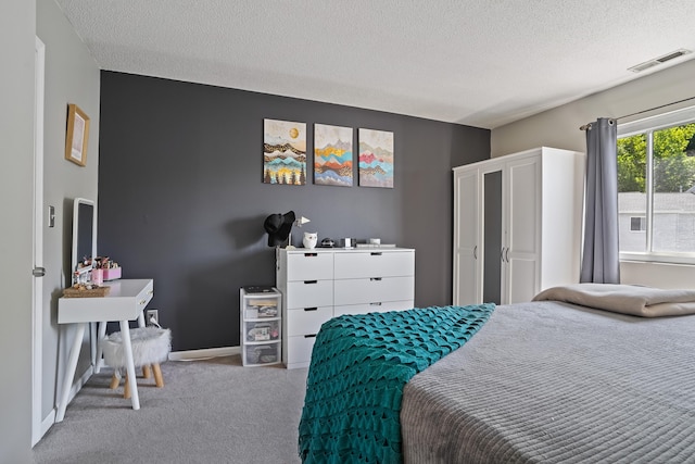 273 Derby Ave Unit 804, Derby, CT 06418 - bedroom featuring carpet floors, a textured ceiling, and baseboards