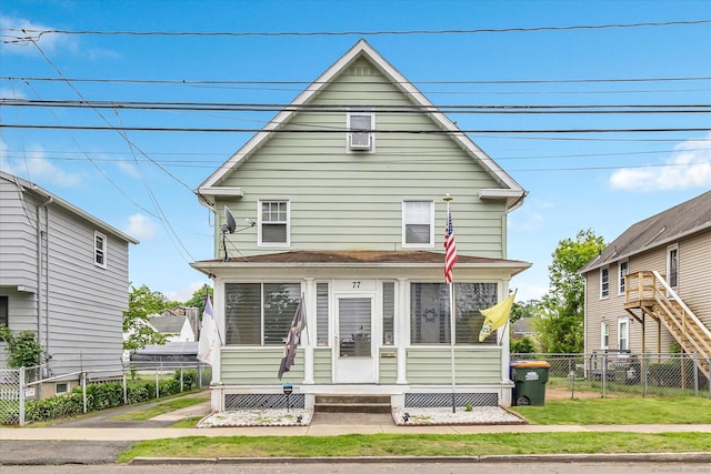 view of front of house with fence