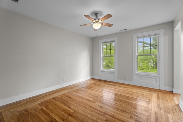 52 Edwards St, New Haven, CT 06511 - spare room featuring light wood-style floors, baseboards, and a ceiling fan