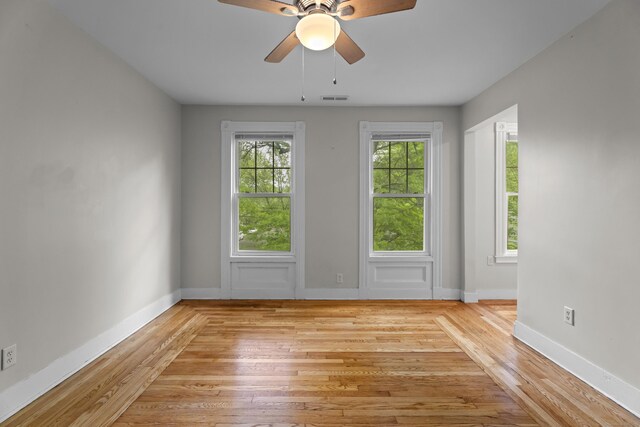 52 Edwards St, New Haven, CT 06511 - unfurnished room with light wood-style floors, baseboards, and ceiling fan