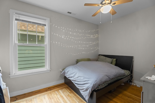 52 Edwards St, New Haven, CT 06511 - bedroom with wood finished floors, baseboards, and ceiling fan