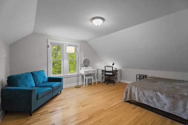 52 Edwards St, New Haven, CT 06511 - bedroom with wood finished floors, vaulted ceiling, and baseboards