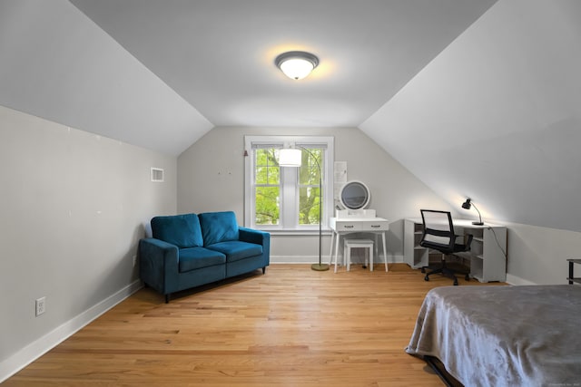 52 Edwards St, New Haven, CT 06511 - bedroom with lofted ceiling, light wood-type flooring, baseboards, and a desk