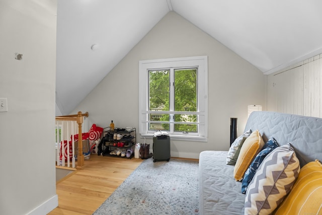 52 Edwards St, New Haven, CT 06511 - bedroom featuring wood finished floors, lofted ceiling, and baseboards