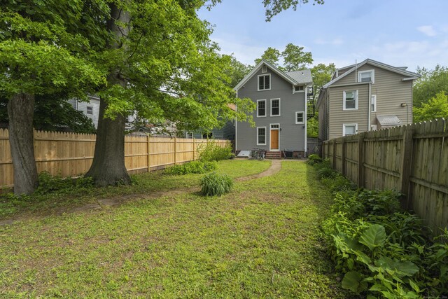 52 Edwards St, New Haven, CT 06511 - view of yard with entry steps and cooling unit