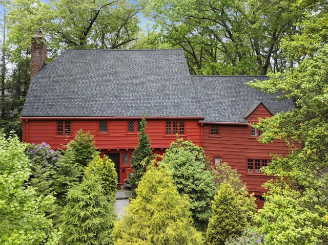 185 Blake Rd, Hamden, CT 06517 - view of front of property featuring a shingled roof and a chimney
