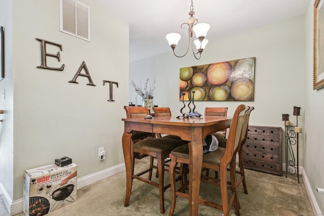 18 Cherokee Ct Unit 18, Cromwell, CT 06416 - dining area with carpet, a chandelier, and baseboards