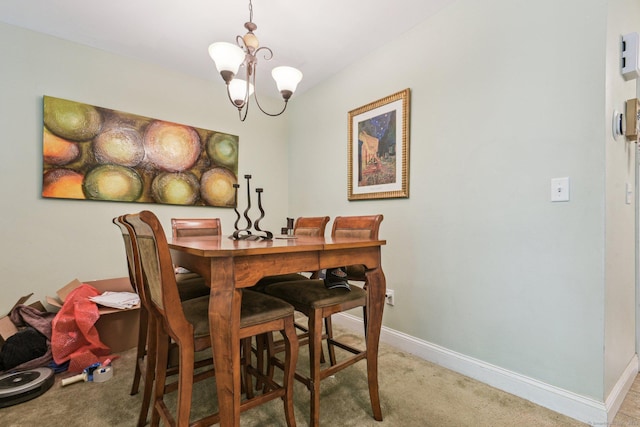 18 Cherokee Ct Unit 18, Cromwell, CT 06416 - dining room featuring light colored carpet, a chandelier, and baseboards