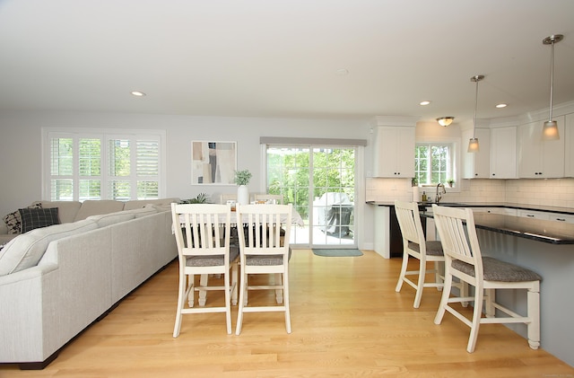 229 Long Hill Cross Rd, Shelton, CT 06484 - dining space featuring light wood finished floors and recessed lighting