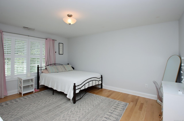 229 Long Hill Cross Rd, Shelton, CT 06484 - bedroom with light wood finished floors and baseboards