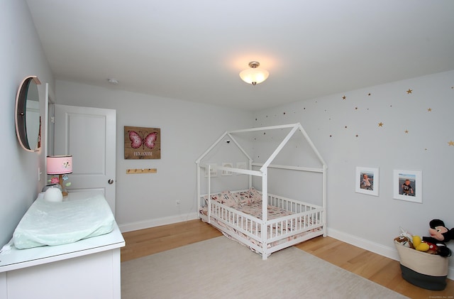 229 Long Hill Cross Rd, Shelton, CT 06484 - bedroom featuring light wood finished floors and baseboards