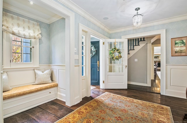 1191 Oenoke Rdg, New Canaan, CT 06840 - foyer with dark wood-style flooring, crown molding, wainscoting, stairs, and a decorative wall