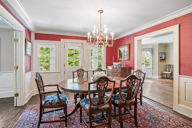 1191 Oenoke Rdg, New Canaan, CT 06840 - dining room featuring healthy amount of natural light, hardwood / wood-style floors, a chandelier, and ornamental molding
