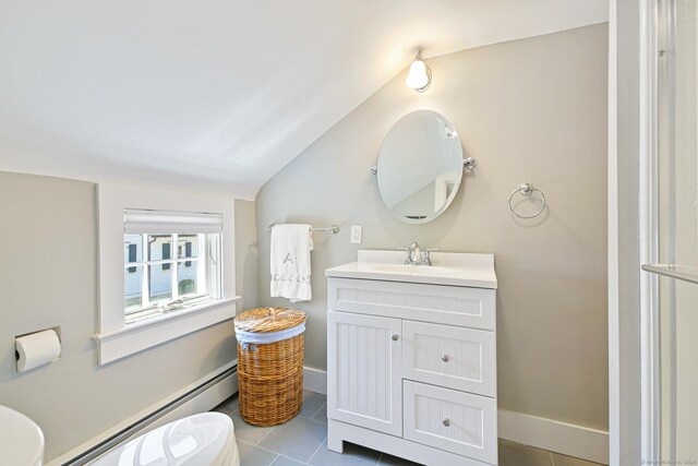 1191 Oenoke Rdg, New Canaan, CT 06840 - bathroom with a baseboard radiator, vanity, tile patterned flooring, toilet, and vaulted ceiling