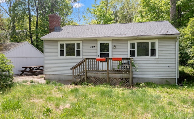 2517 Main St, Coventry, CT 06238 - view of front facade featuring a chimney and roof with shingles