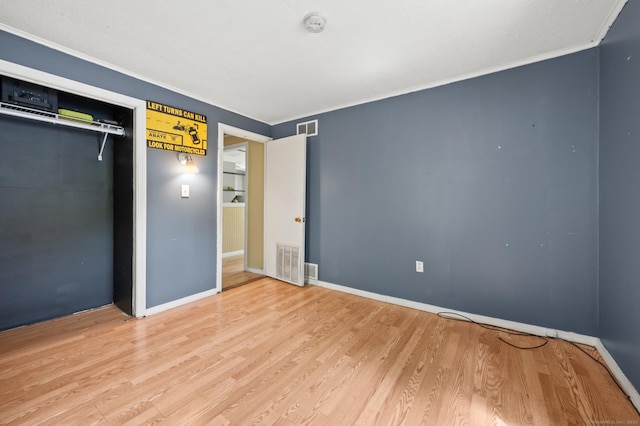 2517 Main St, Coventry, CT 06238 - unfurnished bedroom featuring ornamental molding, wood finished floors, and baseboards