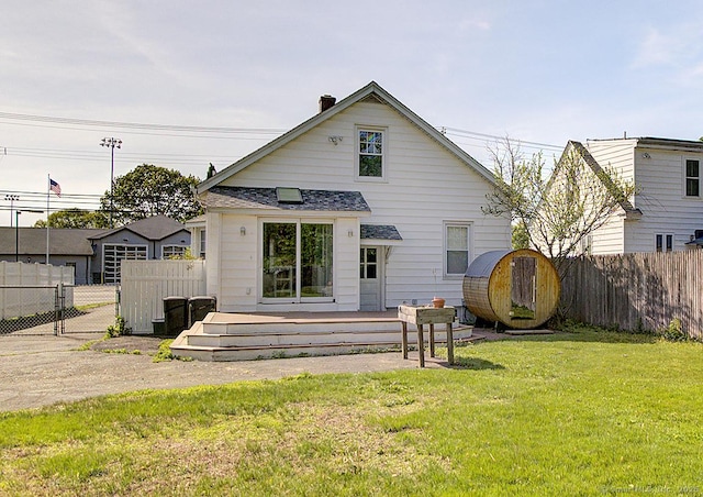 283 Quinnipiac Ave, North Haven, CT 06473 - rear view of house with a wooden deck and roof with shingles