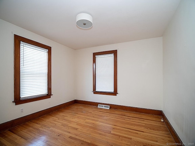 283 Quinnipiac Ave, North Haven, CT 06473 - spare room featuring light wood-style floors and baseboards
