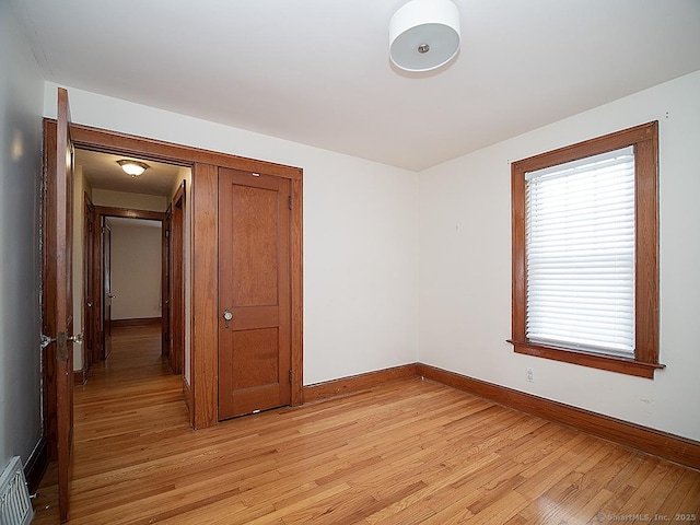 283 Quinnipiac Ave, North Haven, CT 06473 - unfurnished bedroom with light wood-style flooring and baseboards