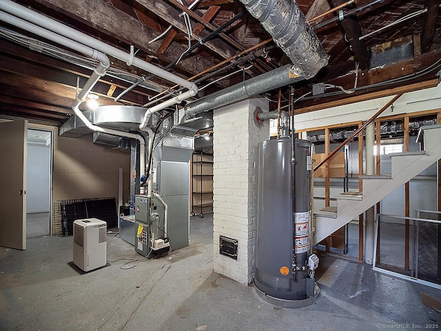 283 Quinnipiac Ave, North Haven, CT 06473 - unfinished basement featuring gas water heater, heating unit, and stairs
