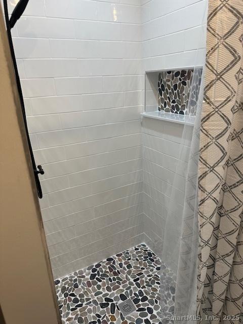 36 Bellevue Ave, Bristol, CT 06010 - full bath featuring tiled shower