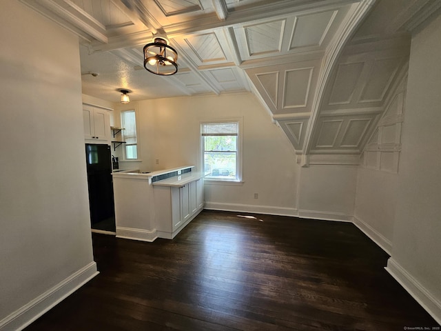 36 Bellevue Ave, Bristol, CT 06010 - kitchen featuring freestanding refrigerator, baseboards, dark wood-style floors, white cabinets, and a peninsula