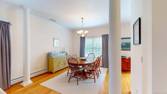 94 E Ridge Rd, Middletown, CT 06457 - dining room featuring light wood-type flooring, crown molding, decorative columns, a chandelier, and a baseboard radiator