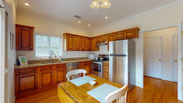 94 E Ridge Rd, Middletown, CT 06457 - kitchen featuring appliances with stainless steel finishes, a sink, light wood-style floors, ornamental molding, and light stone countertops