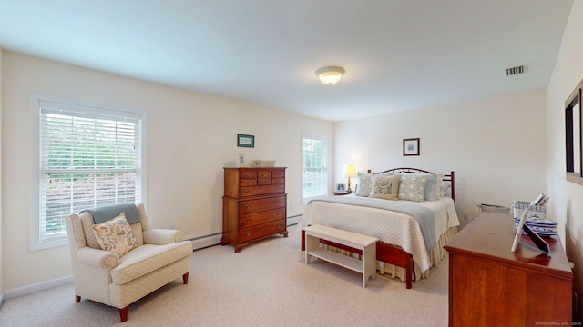 94 E Ridge Rd, Middletown, CT 06457 - bedroom with light colored carpet and a baseboard radiator