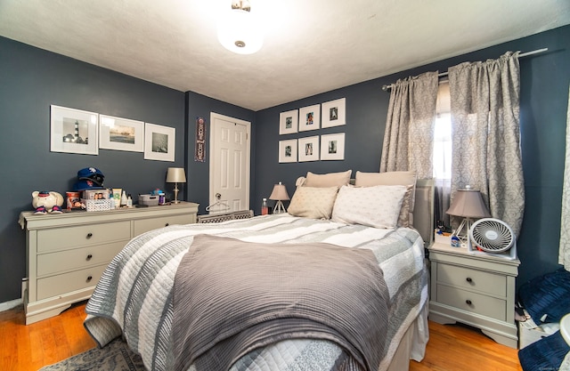 51 Palmetto Trl, East Haven, CT 06512 - bedroom with light wood-type flooring and a closet