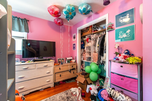 51 Palmetto Trl, East Haven, CT 06512 - bedroom with wood finished floors and a closet
