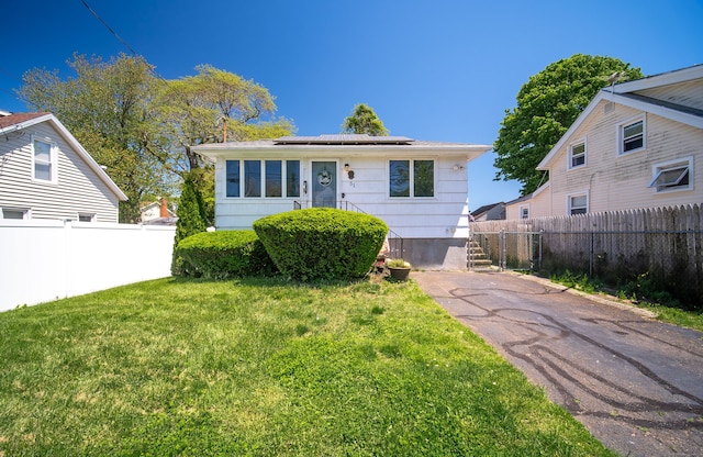 51 Palmetto Trl, East Haven, CT 06512 - view of front of home with roof mounted solar panels